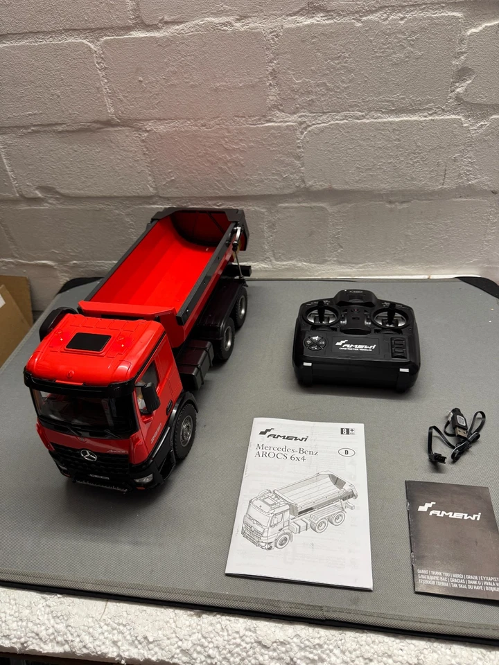 Amewi Mercedes-Benz Arocs Lizenz LKW Kipper 1:14 2,4GHz RTR rot - Bild 4 von 4
