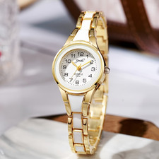Exquisito reloj de cuarzo con pulsera de acero inoxidable y aleación para mujer