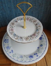 2 tier cake stand with mismatched lavender blue & pink floral plates