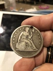1860-O Seated Liberty Silver Dollar (Holed) Good Detail