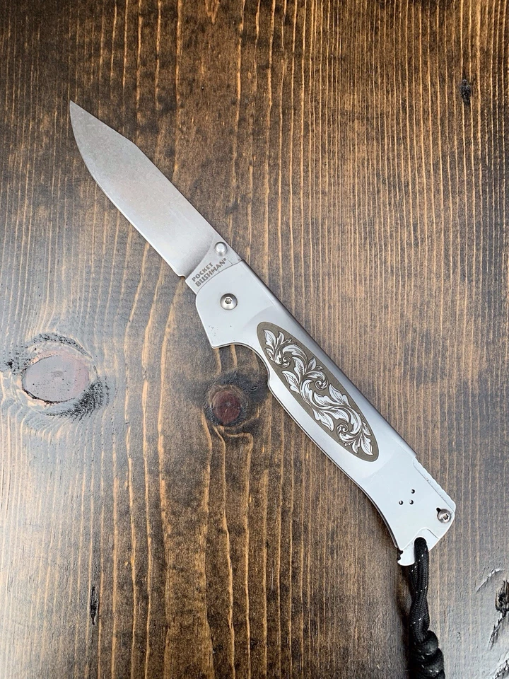 激光雕刻冷钢折叠布什曼口袋刀二手 — 第 3/4 张图片