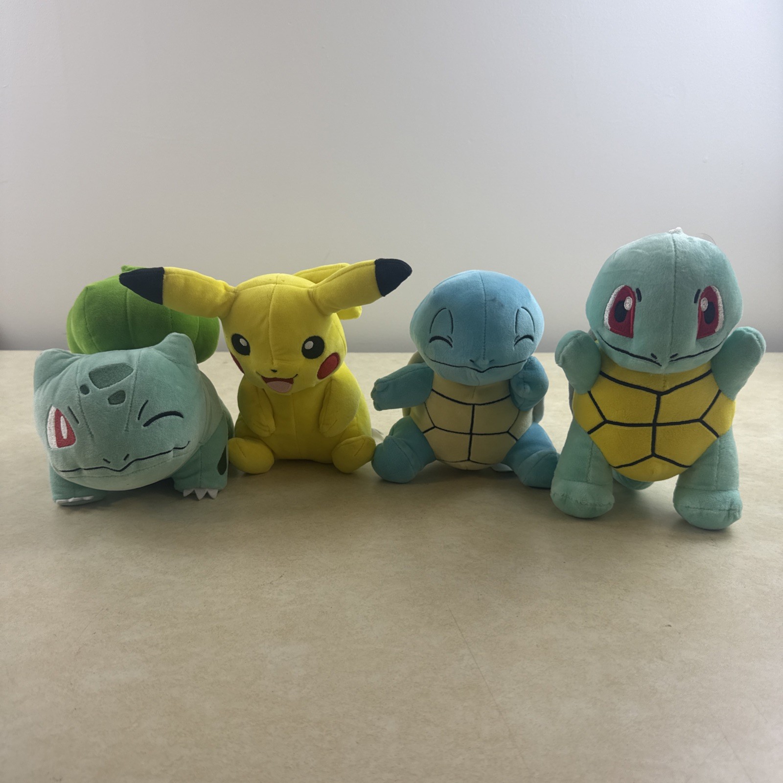 Lot of 4 Pokémon Plush 6” Pikachu Charmander Bulbasaur Squirtle