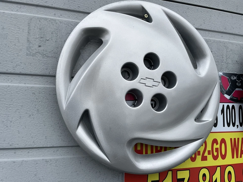 "Chevrolet Cavalier 1992-94 tapacubos originales atornillados, como nuevo usado" Juego 4 Bonito Foto 2 de 4