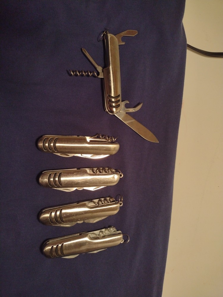 Compact Multi-Tool Folding Pocket Knife with Multiple Functions