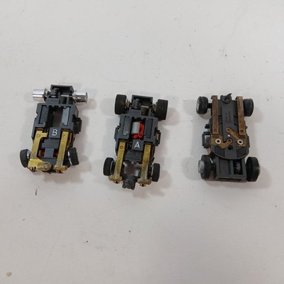 3pc Aurora AFX 2 Ultra5 Slot less Car A B etc CHASSIS PARTS AS IS UNTESTED