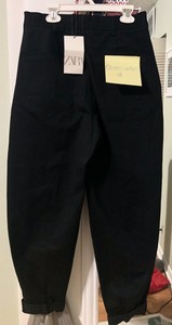 zara calcas plissadas