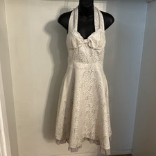 Vintage-style, tea-length halter wedding dress in champagne brocade.  