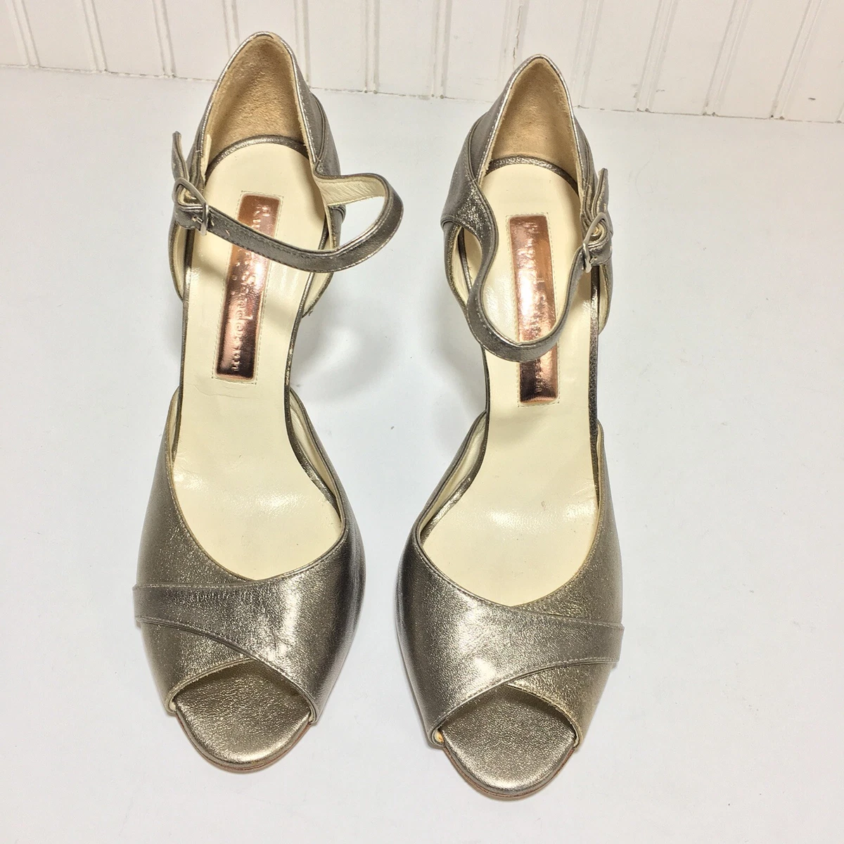 Metallic gold top ankle strap heels