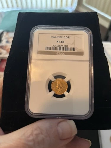 1854 $1 Indian Princess Head Gold Dollar US Coin NGC EF 40 Type 2. ￼