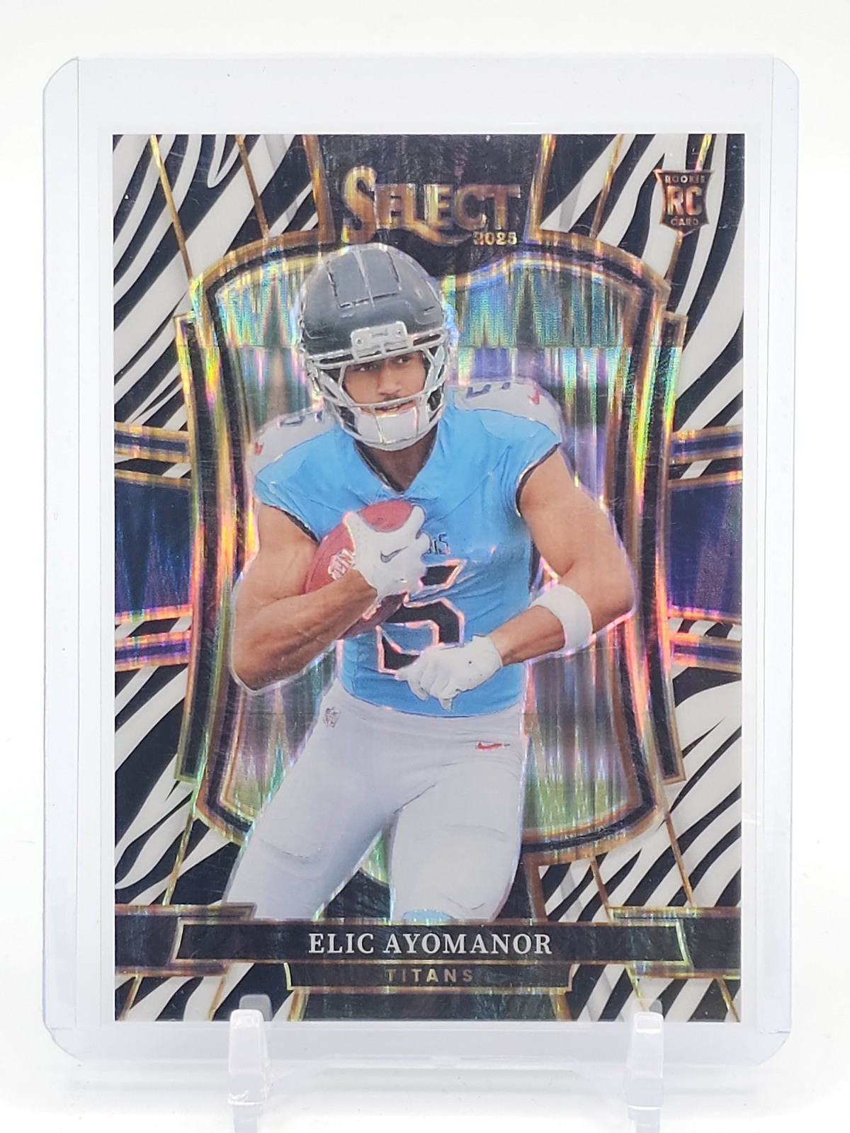 ELIC AYOMANOR 2025 SELECT PREMIER ROOKIE ZEBRA SHOCK PRIZM #127 TITANS Q0783
