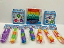LOT of 2 Push Pop Spinners, 7 Push Pop Bracelets, 2 Push Pop Squishers Ages 5
