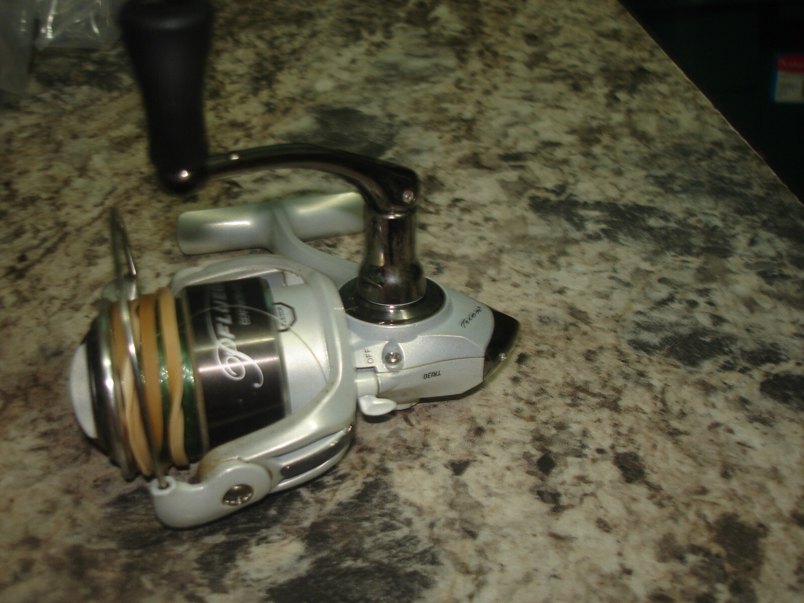 Pflueger Trion TR 130 spinning  fishing reel WORKS