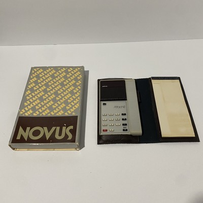 Novus Attache Calculator Year introduced 1975-1976 Power Source 9V  Untested