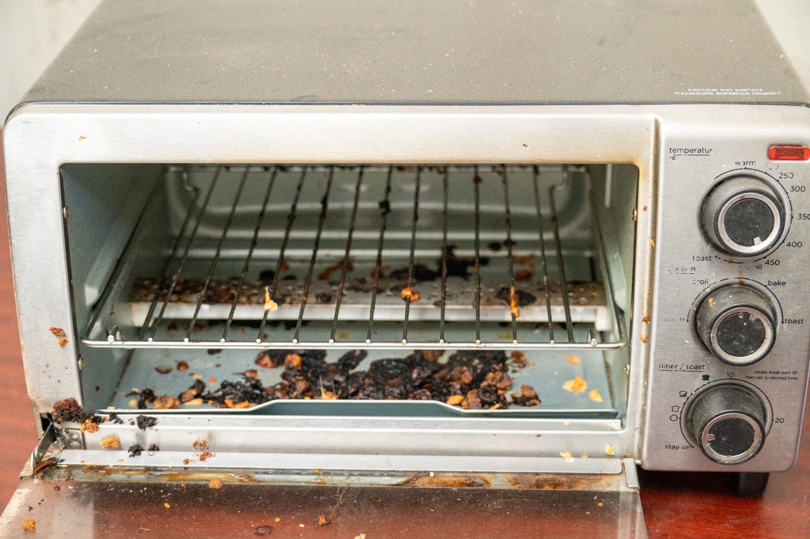 Crusty Toaster Oven, plenty of crumbs and crap that smells like old ...