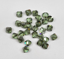 12pc Swarovski Crystal Chrysolite Satin 6mm Bicone Beads; pale matte green