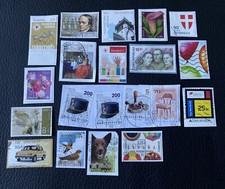 Lot de 20 timbres de Pays divers et années diverses - encore sur fragment! D30