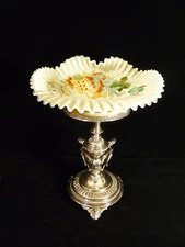 RUFFLED BOWL ON SILVER PLATED CHERUB OR ANGEL CENTERPIECE STAND – CIRCA 1887