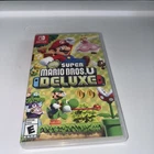 New Super Mario Bros. U Deluxe (Nintendo Switch, 2019) W/ Case. Tested Working