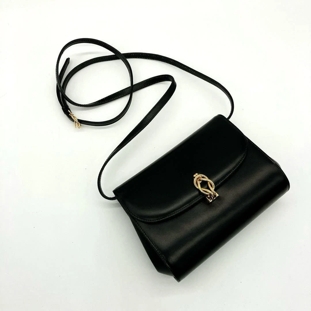 Sac bandoulière GUCCI cuir or quincaillerie noir sans accessoires de chez JP