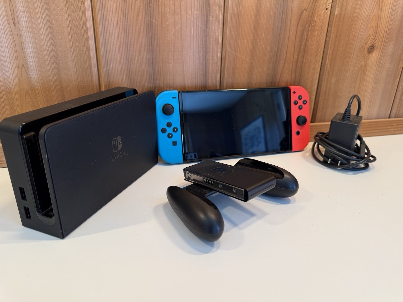 Nintendo Switch 32GB Handheld Console - Red/Blue + Joy Con, Charger, AC Adaptor