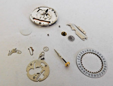 PUW 241 QUARTZ DATE MOVEMENT FOR PARTS or REPAIR. 7 JEWELS. USED