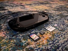 PS Vita Slim PCH-2000 - 128GB SD2Vita + 8GB Memory Card + Free Game - See photos