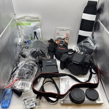 Canon EOS 2000D 24.1MP DSLR Camera, 18-55mm Lens, Tripod, Focus Lens 32GB Bundle