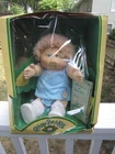 NEVER PLAYED WITH STILL IN BOX (DAMAGED) - 1983-84 CABBAGE PATCH DOLL  W/ PAPERS