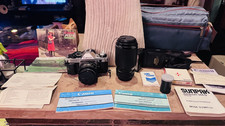 Canon AE-1 Program 35mm SLR Film Camera with 50mm and 75-200mm Sunpak Flash Case