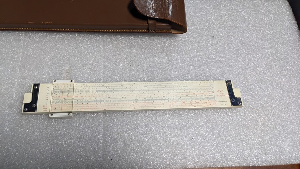 The Vectorlog duplex design with a genuine leather case makes this a display-worthy analog computing artifact, not just a math stick.