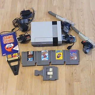 Nintendo NES Bundle (2 Controllers 2 Zappers) Game Genie 4 Mario Games More