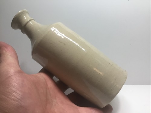 Large Antique Cream Colored Stoneware Ink Bottle. 7 3/4 Inches Tall.