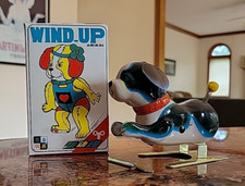 TIN TOY WIND UP JUMPING DOG  MINT IN BOX  