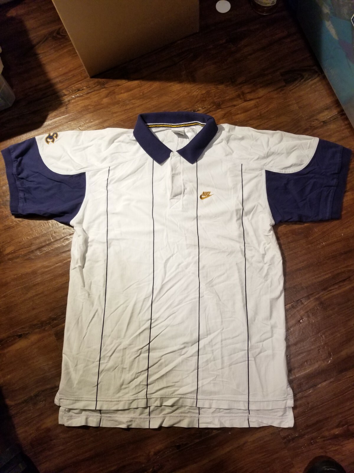 nike supreme court polo