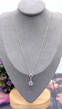 Collier en or rose orné des oxydes et améthystes pendantes Or 375 Millième (9 C