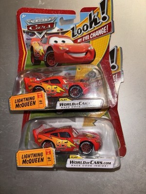 (2) 2008 Lightning McQueen Lenticular eyes Cars Movie 2 versions of front bumper