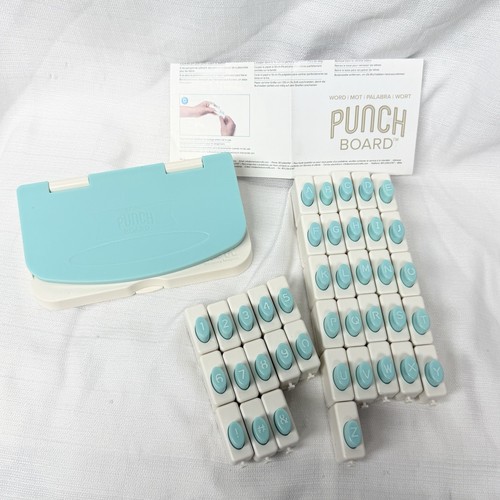We R Memory Keepers Punch Board With 39 Changeable Hole Punches Letters Numbers