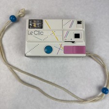 VTG Le Clic Camera White Pink Built-in Flash Powers On 1980s Retro Made in USA