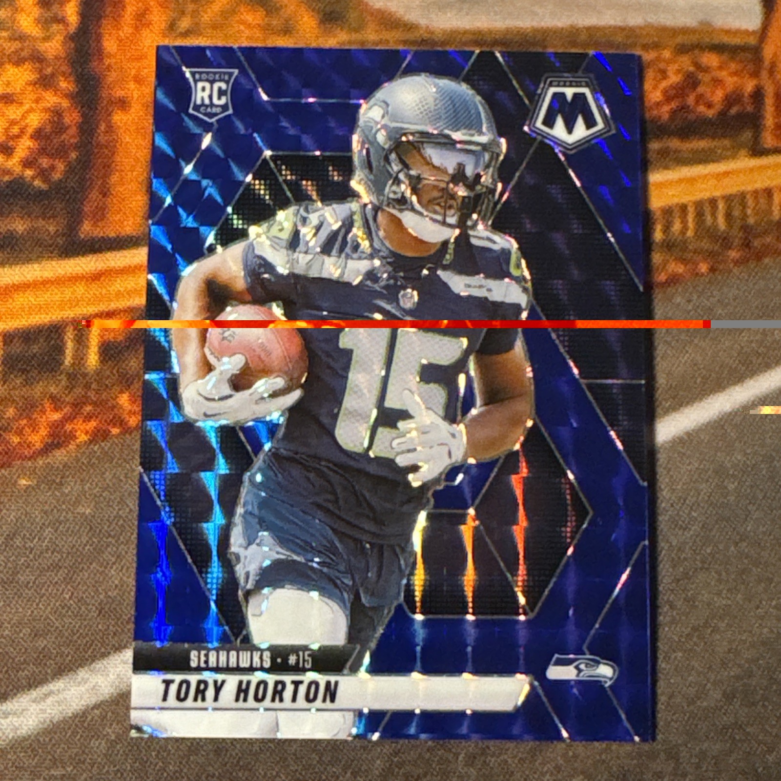 2025 Panini Mosaic - Rookies Tory Horton #396 Blue Mosaic Prizm /99 (RC)