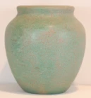 Roseville Early Carnelian 8" massive vase with subtle pale blue glaze.