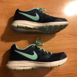 navy green nike shoes