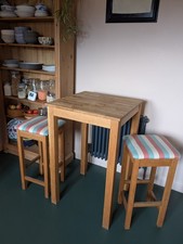 Two solid wood upholstered kitchen / bar stools in stripey fabric (table sold)