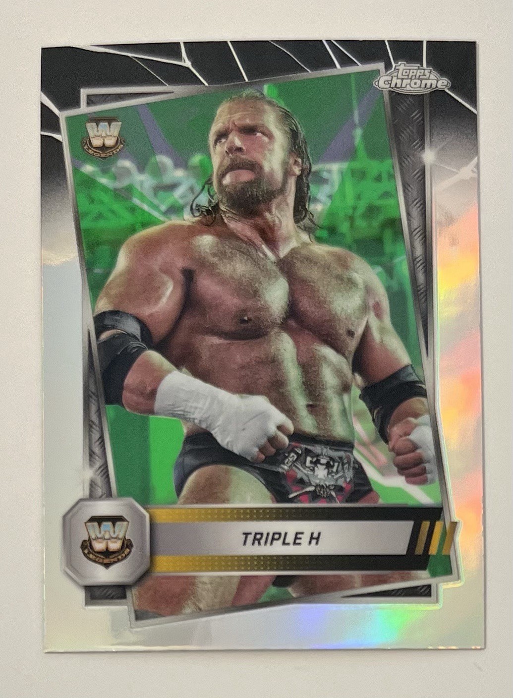 2025 Topps Chrome WWE #22 Triple H Neon Green and Black Refractor
