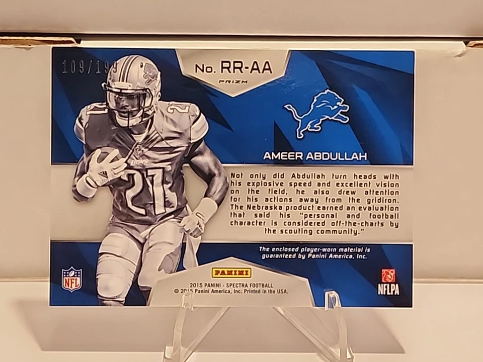 2015 Panini Spectra - Rising Rookie Ameer Abdullah #RR-AA /199 (RC) [L1] - Image 2 of 3