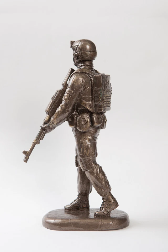 Estatuilla "Machine artillero" Foto 4 de 4