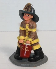 2009 Vanmark Red Hat Of Courage Boy Firefighter Figure