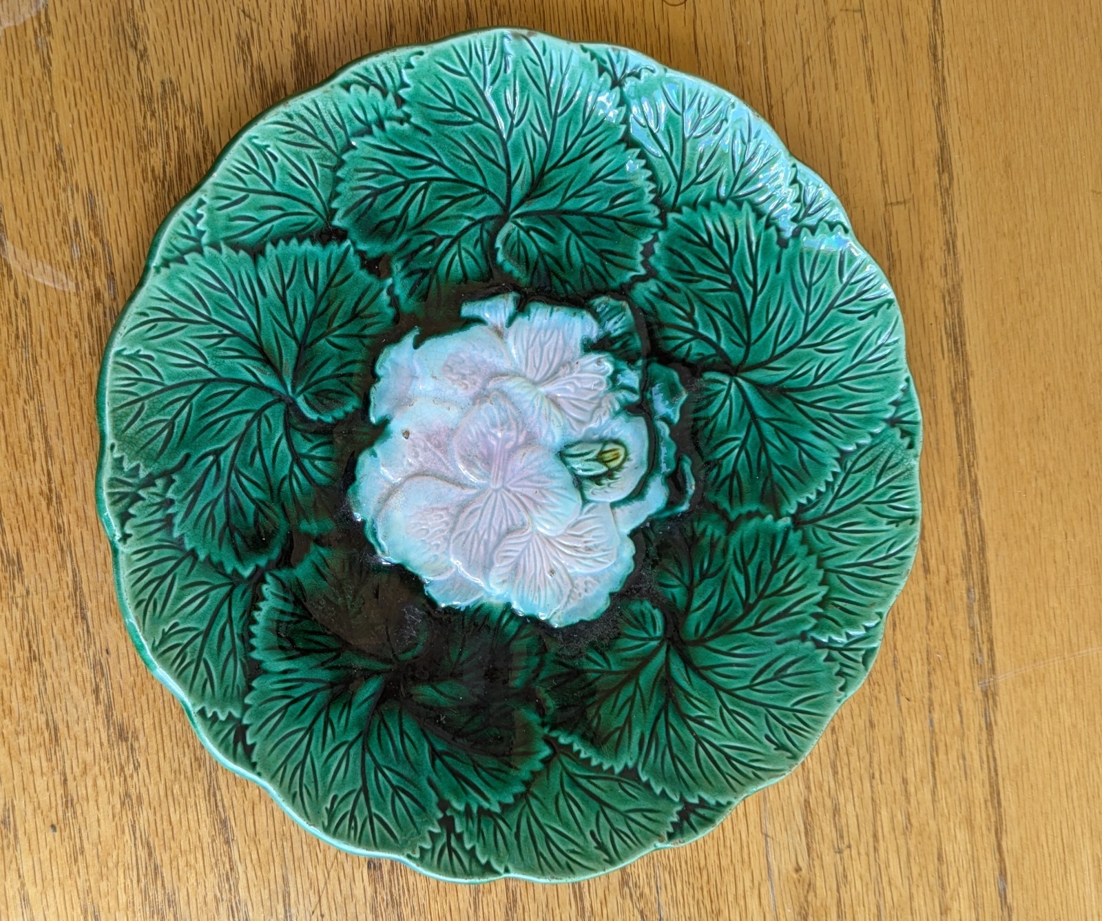 Antique Green Majolica Plate With Geranium Leaves, Bud And Flower