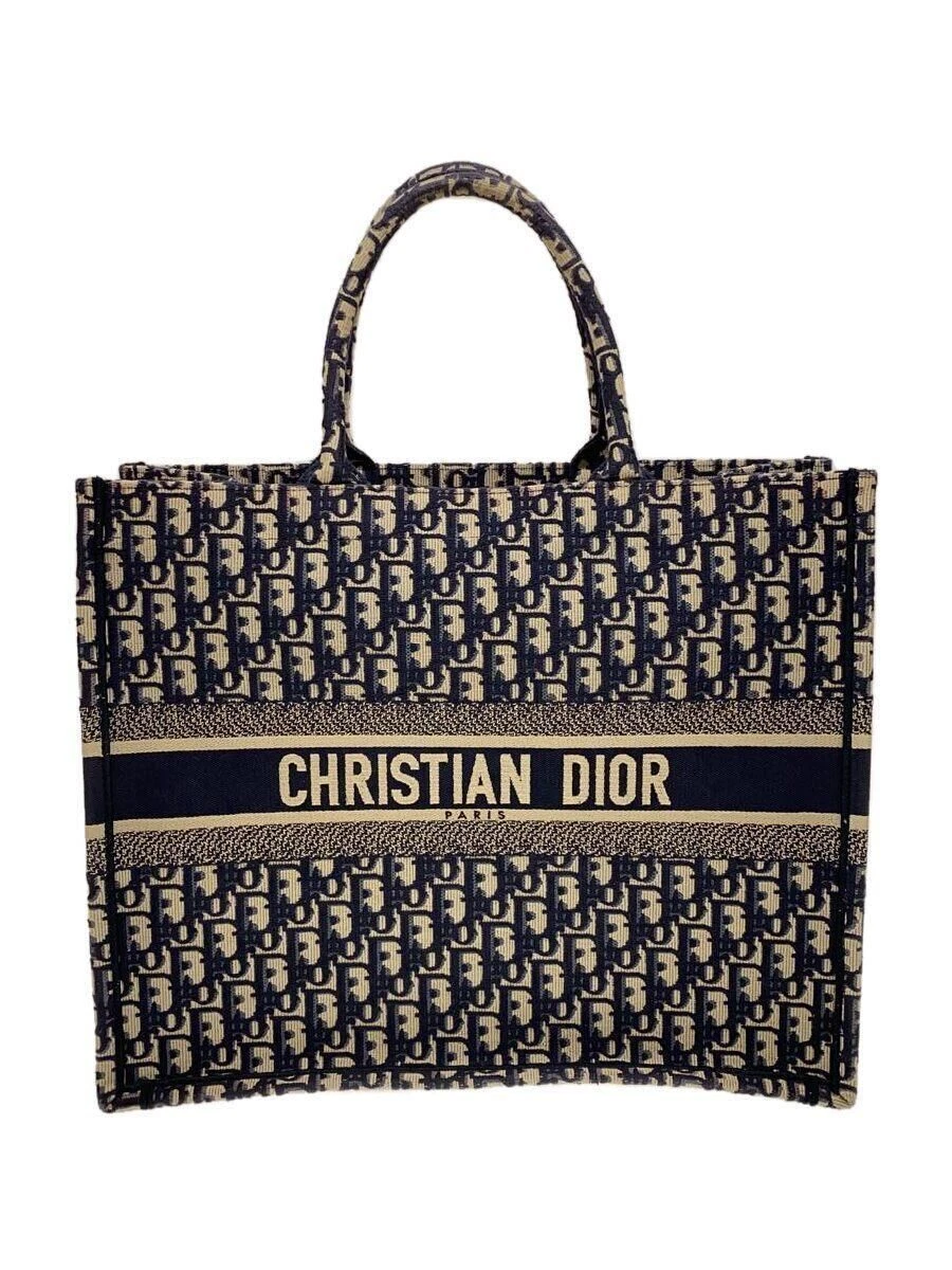 Sac fourre tout Christian Dior trotteur livre oblique toile bleu marine motif total occasion