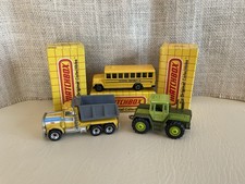 Vintage Matchbox 1985 School Bus, 1981 Peterbilt Quarry Truck, 1990 Tractor