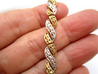 10K Yellow & White Gold Diamond-Cut Wavy Link Bracelet — photo 6